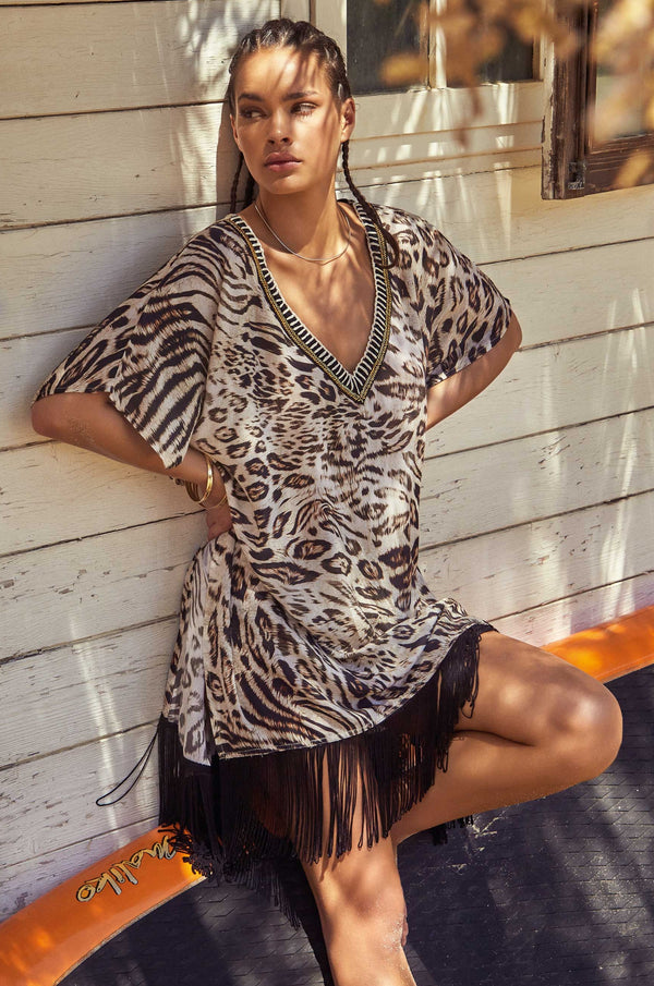 ANIMAL PRINT PONCHO WITH FRINGES